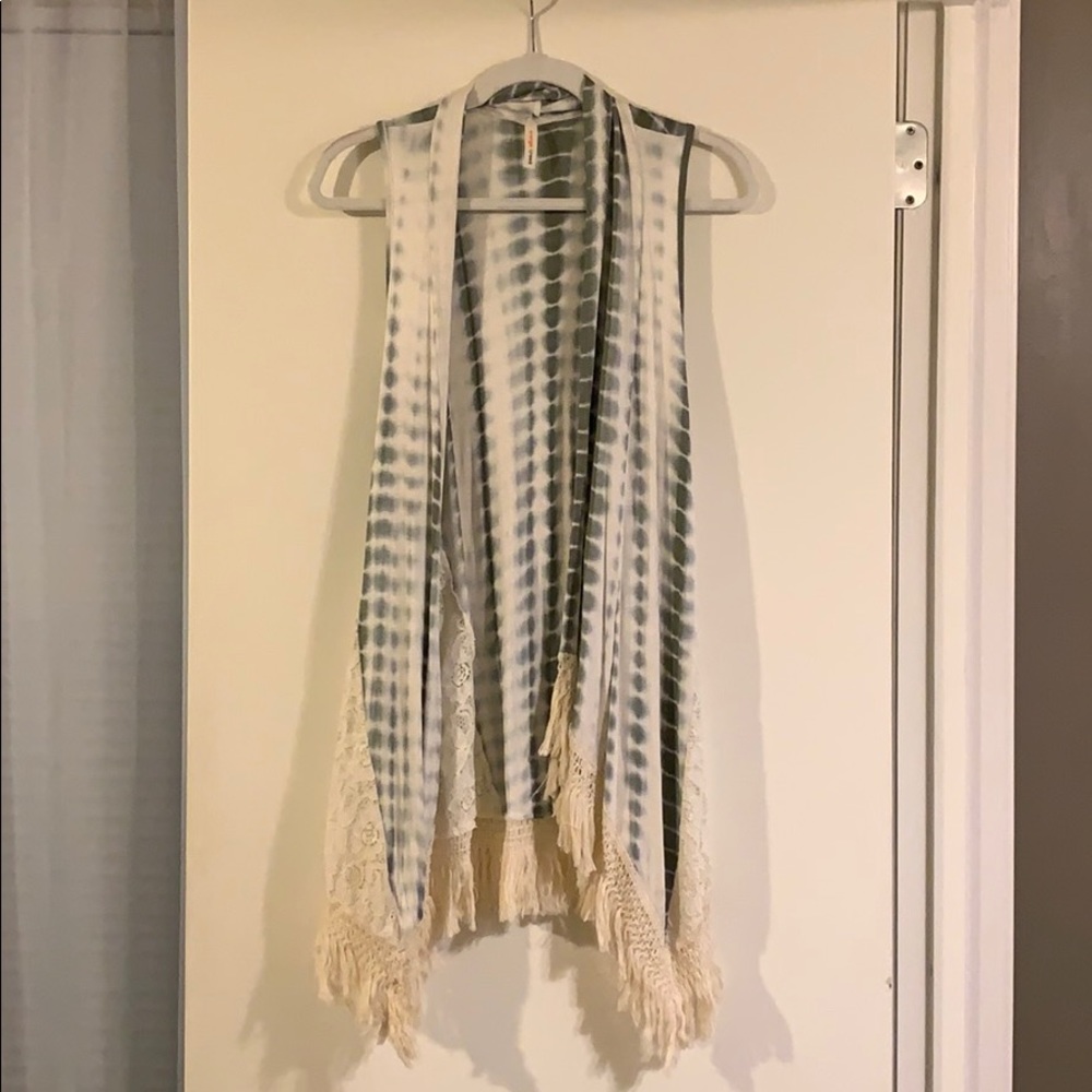 Green and white sleeveless cardigan
